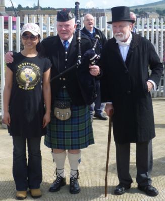 Mr Bell and a piper
'Mr Bell' is pictured with a youngster and a piper on Helensburgh pier during the bicentenary celebrations on Saturday August 4 2012. Photo by Davie Dewar.
