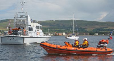 Demonstration
The Rhu RNLI rescue boat gave a demonstration of a rescue as part of the bicentenary celebrations off Helensburgh pier on Saturday August 4 2012. In the background is HMS Pursuer, a patrol boat from the Clyde Naval Base at Faslane, which led the nautical convoy from Rhu Marina to Helensburgh. Photo by Kenneth Speirs.
