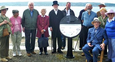 Panel unveiling
A new panel featuring information about the town, including references to Henry Bell and his ground breaking invention, was unveiled by 'Mr Bell' on Helensburgh seafront as part of the bicentenary celebrations on Saturday August 4 2012. The panel replaces an earlier version which was one of ten put in place to encourage motorists to explore â€˜The Clyde Sea Lochs Trailâ€™, a scenic coastal route from Dumbarton via Cardoss, Helensburgh, Rhu, Garelochhead and the Rosneath Peninsula to Arrochar. Among those in the picture are Mrs Pat Wiseman, ex-Provost Billy Petrie, Mrs Doris Gentles, John Urquhart, Stewart Noble and Kenneth Crawford. Photo by Davie Dewar.
