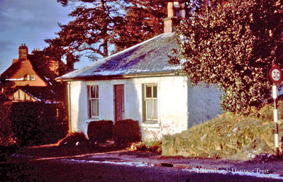 Toll Cottage
The Toll Cottage at the top of Sinclair Street, Helensburgh, which in 2018-19 was substantially expanded and modernised, and is now a private dwelling. On the left is the mansion Ardluss. During World War Two it was planned to situate a roadblock at the cottage, using old tramlines placed in prepared holes, to keep out German invaders. This 1962 image was taken by Stewart Noble.
