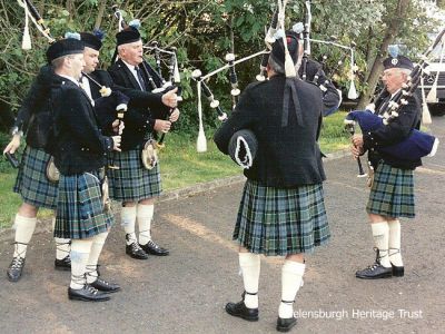 Tuning up
Members of Helensburgh Clan Colquhoun Pipe Band prepare before entertaining tourists at Duck Bay, Loch Lomond, in 1997. Image kindly supplied by Gordon Fraser, who now lives in Sweden.
