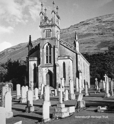 Arrochar Church
The present Arrochar Parish Church was built in 1847, but it had fallen into such a bad state of repair that in 1998 it was declared to be too dangerous to enter. However the community worked tirelessly to change this situation, with the result that it was reopened for worship in the following year. The parish of Arrochar was established in 1659, but no church was built until 1773 and the ruins of this earlier church stand alongside the present church. Photo by Professor John Hume.
