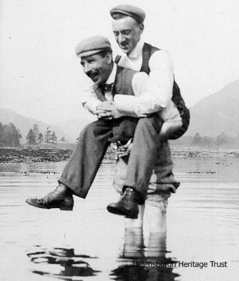 Birthday paddle
A paddling Andrew Bonar Law gives a friend a piggyback on a 21st birthday outing to Arrochar. Image by courtesy of Arrochar, Tarbet and Ardlui Heritage Group.
