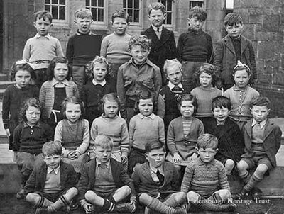 Clyde Street School 1951
A picture of a class at Helensburgh's Clyde Street School. Image supplied by Alex Hunter, Ontario, Canada, who is in the front row, second from the right. The boy on his right is Joe McKell, who went on to become a well known local footballer. The teacher was Miss Laing. Alex would welcome any further information.
