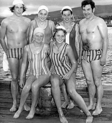 Pier to pier swim
Entrants in the annual Craigendoran pier to Helensburgh pier race run by Helensburgh Amateur Swimming Club are pictured on Craigendoran pier before the start. The winners were Jacqueline Craig (2nd from right) and Ken Mercer (right). Image circa 1965.
