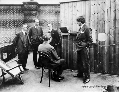 Daylight TV
Daylight TV at Long Acre in 1930, with John Logie Baird on the right.
