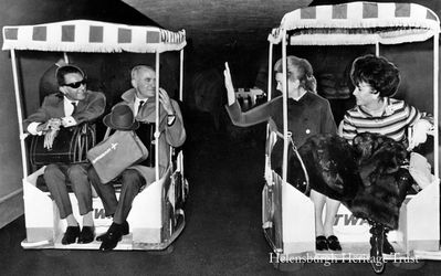 Deborah Kerr and Elizabeth Taylor
Helensburgh film star Deborah Kerr and her second husband, writer Peter Viertal, are seen with Elizabeth Taylor and her husband Richard Burton on board carts at New York's Kennedy Airport on November 15 1967 on their way to Los Angeles. This Associated Press wirephoto has been slightly touched up for publication to ensure that the couples stand out from the dark background.
