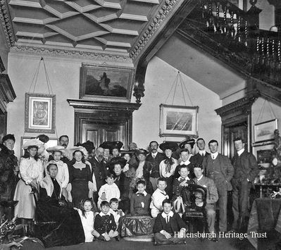 The Kidston Family
Members of the Kidston family, who owned the mansion Ferniegair next to Cairndhu on the west seafront, are pictured at a family Christmas party, circa 1900. The Kidstons were great benefactors to Helensburgh over many years. Andrew Bonar Law, the burgh man who became prime minister, can be seen on the left in the back row. The photographer was John Stuart, of Thistlebank, Helensburgh. Image supplied by the late John Johnston.
