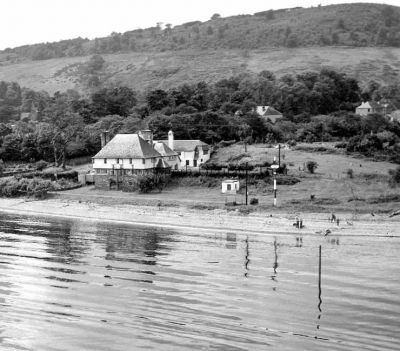 Ferry House
An aerial view of Ferry House, Rosneath, formerly Ferry Inn, taken in 1965. The Edwin Lutyens-designed building was commissioned by Queen Victoria's daughter Princess Louise, the Dowager Duchess of Argyll, in the 1890s and rebuilt from an old pub. Bob Hope stayed there while entertaining troops at the nearby World War Two naval base. It fell into disuse, but was rebuilt again in the late 1950s by boatbuilder Peter Boyle.
