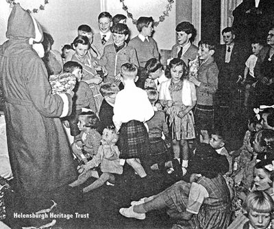 Christmas at BP Finnart
A children's Christmas party at the BP Ocean Terminal at Finnart, Loch Long, circa 1954. Image supplied by Alastair McIntyre.
