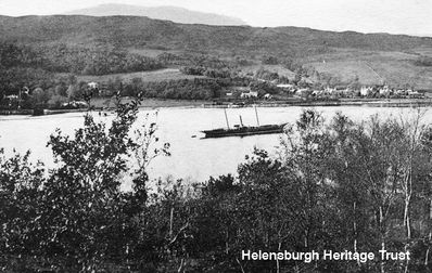 Garelochhead Bay
Looking west from Garelochhead across the loch to Dalandhui, with a large yacht moored offshore. Image circa 1905.
