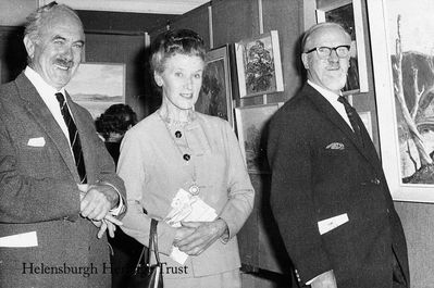 Art Show opening
Guest of honour Hugh Adam Crawford RSA (right) with his wife and local artist Gregor Ian Smith, president of Helensburgh and District Art Club, at the opening of the club's annual show in the Victoria Hall in September 1968.
