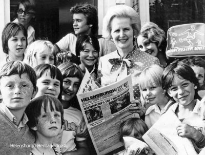 PM in Churchill
Prime Minister Margaret Thatcher is seen visiting and meeting children at the naval married quarters estate at Churchill, Helensburgh, in 1976. Photo by Brian Averell for the Helensburgh Advertiser.
