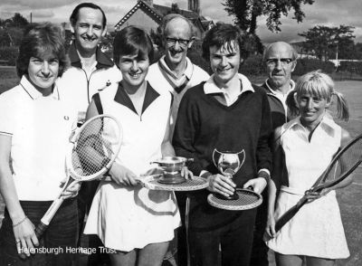 Prizewinners
Club championship prizewinners at Helensburgh Lawn Tennis Club c.1970. From left: Jane Abel, Donald Fullarton, ?, David Arthur, Alastair Hope, Alex Hewitt and Marie Dixon.
