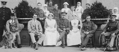 Hermitage patients
During World War One from 1914-18 the Helensburgh Town Council-owned Hermitage House in Hermitage Park became a military hospital with a capacity for 58 patients who were sent from Stobhall Hospital in Glasgow. The wounded men in their blue uniforms were a familiar sight in the town, being wheeled around the park by their nurses. A number of local ladies and girls helped out in the hospital and the local Red Cross detachment also assisted the trained nurses. Many local girls met their future husbands among the wounded â€˜tommiesâ€™, and patients were taken on outings in a horse-drawn carriage from Waldie & Co. in Sinclair Street.
