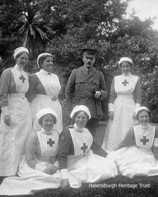 Hermitage nurses
During World War One from 1914-18 the Helensburgh Town Council-owned Hermitage House in Hermitage Park became a military hospital with a capacity for 58 patients who were sent from Stobhall Hospital in Glasgow. The wounded men in their blue uniforms were a familiar sight in the town, being wheeled around the park by their nurses. A number of local ladies and girls helped out in the hospital and the local Red Cross detachment also assisted the trained nurses. Many local girls met their future husbands among the wounded â€˜tommiesâ€™, and patients were taken on outings in a horse-drawn carriage from Waldie & Co. in Sinclair Street.
