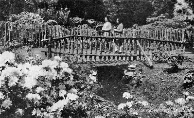 Rustic bridge
A couple walk across one of the rustic bridges at the south end of Hermitage Park. Image circa 1950.
