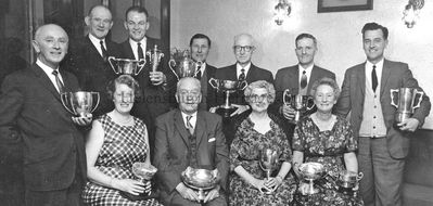 High Green winners
Prizewinners at the Helensburgh High Green annual dinner in the Ardencaple Hotel, Rhu, in November 1964. Standing (from left): Arthur Wylie, William Niven, William Cowe, George Sharpe, secretary John Omnet, William Gilvear, James A.Gow; seated: Mrs Thomson, president Duncan McFarlane, ladies president Mrs J.McColm, Mrs D.Gall.
