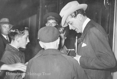 Jack Buchanan
The great entertainer from Helensburgh pictured signing autographs at London's Waterloo Station on September 25 1937. He was on his way to New York to appear with Evelyn Laye in a musical comedy.

