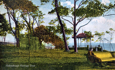 Kidston Park
A lady sits on a bench in the evening sunlight in this old image of Kidston Park, Helensburgh. Bought from the Duke of Argyll in 1877 for Â£650 by William Kidston with help from Sir James Colquhoun and others, it was formerly Cairndhu Point â€” known locally as Neddy's Point after a well known fisherman and ferryman who lived nearby â€” but was renamed Kidston Park from 1889 when Mr Kidston left money to support its maintenance and requested the name change.
