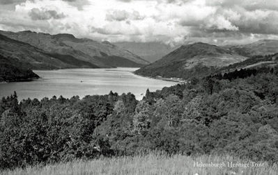 Loch Long
An old image of Loch Long, showing Glenmallan and its school on the right, taken by W.W.Kim. Image supplied by Winnie Miller, who thinks the boat is probably one used to recover torpedoes.  Onn the left side, just above the sharp point of shoreline, is a direction-finding tower.
