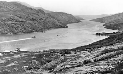 Loch Long Torpedo Range
This picture, circa 1950, shows the Loch Long Torpedo Range which was in use from 1912-86. The building was badly damaged by fire and demolished in 2007. Activity at the range reached a peak during World War Two, with more than 12,000 torpedoes being fired down the loch in 1944. 
