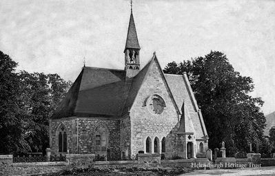 Luss Parish Church
Luss Parish Church, circa 1907. This picturesque village church, the third on this site on the banks of Loch Lomond, was built by Sir James Colquhoun in 1875 in the memory of his father who died along with five ghillies in a drowning accident off Inchtavannach. It has beautiful stained glass windows and a uniquely timbered roof, featured frequently in the TV soap 'Take the High Road', and has also hosted many celebrity weddings. The ancient graveyard has 15 listed ancient monuments, the earliest lie at the main entrance to the church, two slabs, each with a simple cross from the 7th or 8th century.
