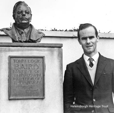 Malcolm Baird at bust unveiling
Malcolm Baird, the inventor's son and now a retired professor and president of Helensburgh Heritage Trust, is pictured at the unveiling of a bust of John Logie Baird in Hermitage Park, Helensburgh, in 1960. Some years later the bust was moved to a position on the seafront opposite William Street.
