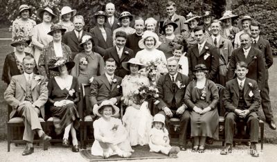 Rhu wedding
Alice McDougall kindly supplied this picture of the wedding of her parents, Mr and Mrs Alexander Rankin Gold, in Rhu on July 16 1936. They were married from Armadale House in Rhu where her mother, Flora MacKinnon, worked for Colonel Kenneth Barge as a cook and where this picture was taken. Alice says: "Lydia Barge is the older girl seated in front of my father. My grandparents from Brechin are beside my father. My grandfather from Skye ibeside my mother. Beside him is Auntie Lottie an her husband John Cree who lived in Craigendoran, and their daughter is the other little girl. She had a shop at the east end of Helensburgh at one time I believe. Behind John Cree is Colonel Barge and behind his right shoulder is, I believe Nigel Barge."
