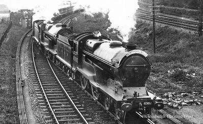 The Northern Belle
6392 engine Malcolm Graeme piloting 6391 Wizard of the Moor on the 'Northern Belle' cruising train, leaving Craigendoran Station in June 1935. Image supplied by Jim Chestnut.
