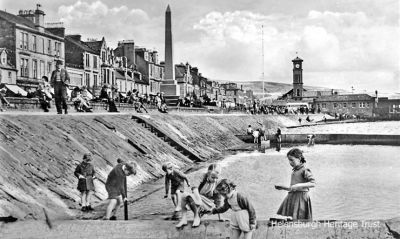 Paddling pool
Children play in the now removed paddling pool on Helensburgh's West Esplanade. Image circa 1951.

