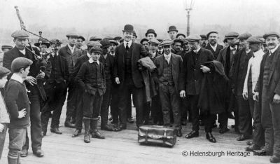 Fond farewell
Friends of all ages say farewell to a Helensburgh man leaving from Helensburgh Pier. Possibly 1930s, but no further details are known, so any information would be welcomed. Image supplied by Malcolm LeMay.
