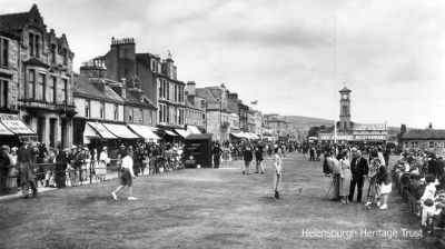 Busy putting green
Helensburgh's West Esplanade is packed and the putting green busy in this 1941 image, with the Granary Restaurant and the Old Parish Church beyond.
