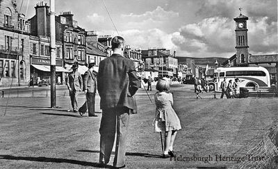 The putting green
Play on Helensburgh's West Clyde Street putting green, while a bus waits at the pierhead. Image circa 1952.
