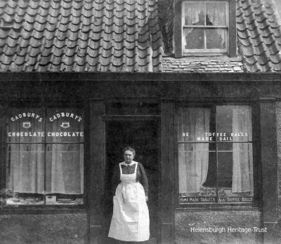 Sweetie shop
Margaret Reece is pictured outside her sweetie shop which was at the corner of Clyde Street and Maitland Street, Helensburgh, circa 1910. The sweets were made at the rear of the shop. Image supplied by her great grand-daughter Sue Taylor.
