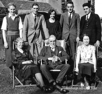 The family of keen amateur photographer Robert Thorburn in 1932. Standing from left: John McKenzie, Robert Douglas, Jessie (nee Troupe), James, Alexander Graham; front: Christina (nee Graham), Robert and Mabel. John emigrated to South Africa and his family are still there; Robert Douglas was in the oil industry, died in Burma, his only daughter Fiona is in Kirriemuir; James also a keen photographer was a bank manager in Fort William for many years; my father Alexander was an engineer, spent the war in the torpedo factory on Loch Long then worked for Rolls Royce before going to Workington as a machine shop manager; Mabel, the sister, died shortly after her parents in 1946. Image supplied by Sandy Thorburn.
