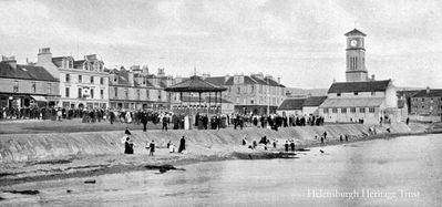 The band playing in the now demolished Helensburgh seafront bandstand in what is now the pier car park attracted a big audience on this occasion. Image date unknown.
