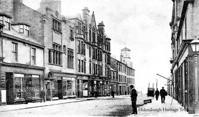 Sinclair Street
Looking down Sinclair Street to the Old Parish Church tower on the seafront from the Princes Street junction, circa 1910. Shops visible include Campbell's Saleroom, R. & J.Dick, Paterson's, and W.G.Christie.
