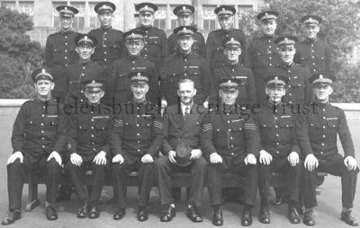 Special Constabulary
Helensburgh's Special Constables 1942. Back row: Jimmy Michie, unknown, unknown, Tommy Dunlop janitor at Hermitage, Mr MacFarlane, Harry Taylor who had the chemists shop in West Clyde Street now Ladbrokes, George Loban stalwart of St Columba Church. Middle: unknown, unknown, Sam Colville, unknown, Cyril Douglas. Front: Elky Clark school attendance officer, unknown, Robin Spy coal merchant, unknown, Bill Bowman woodwork teacher at Hermitage, Lindsay Keir, Arthur McCulloch. Photo supplied by Iain McCulloch.
