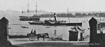 Talisman at Rhu
The North British steamer Talisman, built in 1896 by A. & J.Inglis, approaches Rhu Pier. In the background is the Training Ship Empress, while on the right Rosneath Castle can be seen across the loch. This image, circa 1915, was used on the cover of John Hood's book of old photos entitled 'Old HELENSBURGH, RHU & SHANDON'.
