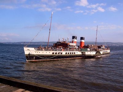 Waverley at Helensburgh
The paddle steamer Waverley arrives at Helensburgh pier in the evening sunlight of June 22 2005 on the annual midsummer sail. Built by A. & J.Inglis at Pointhouse, Glasgow in 1946, the 693-ton Waverley entered service in 1947 and is the world's last sea-going paddler. Photo by Robert Ryan.
