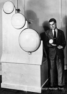 William Taynton
William Taynton is seen with large cathode ray tubes at Radiolympia in 1939.
