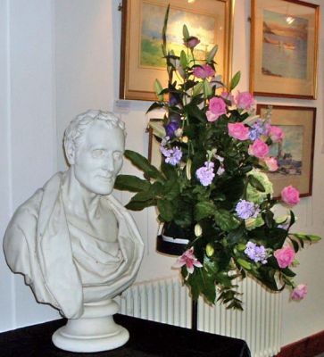 Floral tribute
The bust of Henry Bell and a floral decoration by Judy Noble at the opening of the Henry Bell and the Comet exhibition, compiled by Doris Gentles, in Helensburgh Library on Friday August 3 2012. Photo by Eleanor McKay.
