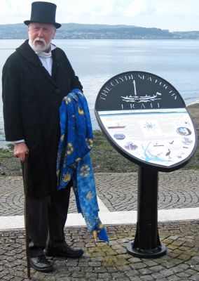 New panel
'Henry Bell' unveiled a new panel featuring information about the town, including references to himself and his ground breaking invention, on Helensburgh seafront as part of the bicentenary celebrations on Saturday August 4 2012. The panel replaces an earlier version which was one of ten put in place to encourage motorists to explore â€˜The Clyde Sea Lochs Trailâ€™, a scenic coastal route from Dumbarton via Cardoss, Helensburgh, Rhu, Garelochhead and the Rosneath Peninsula to Arrochar. Photo by John Urquhart.
