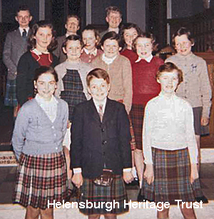 St Andrew's Church Junior Choir
The Junior Choir of the then St Andrew's Church (now Helensburgh Parish Church) is pictured about 1961. The choir was conducted by Mrs McIntyre (wife of Jim McIntyre of Dow's meat counter) and then by Mrs Rita Peoples. Image supplied by Alistair Quinlan.
