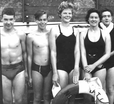 Piers Swim
Some of the Helensburgh Swimming Club members who took part in the annual Craigendoran pier to Helensburgh pier swim in August 1963. From left: Ken Mercer, Rod MacPhail, Elizabeth Soutar, Sandy MacRitchie, Colin McCallum. It was the first time Rod entered, and his time of 47 minutes on a calm night was the fastest he ever achieved. Ken Mercer, whose mother Edith taught hundreds of local children to swim, won it for the umpteenth time in 25-28 minutes.
