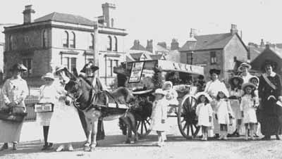 Heather Day
Supporters of the Society for the Prevention of Cruelty to Children take a Heather Day collection in Colquhoun Square in September 1918. The message of the trays reads: â€œSend Good Luck to your Friends at the Frontâ€.

