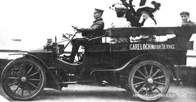 Bus service
David Wilson drives the Gareloch Motor Service vehicle run by MacFarlane and Gilmour. Image, circa 1906, supplied by his grand-daughter, Marlyn Ritchie.
