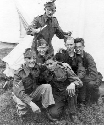 Fun at camp
Members of 162 Battery (Helensburgh), 54 Regiment Light Anti-aircraft, Royal Artillery, Territorial Army, at camp in the late 1930s, venue unknown. The smiling man in the centre is Jonny Tait. Image supplied by Colin McIvor of Largs.
