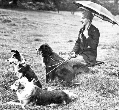 Sheepdog trials
A young lady with dogs at the Helensburgh and District Sheepdog Trials at Camis Eskan Farm, circa 1930. Photo by James Russell, Alexandria.

